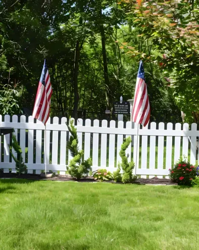 Fence and american flags.